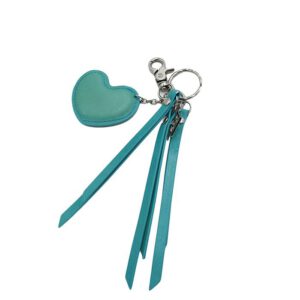 Leren sleutel hangers, set van twee sleutelhangers, Roos en Groen