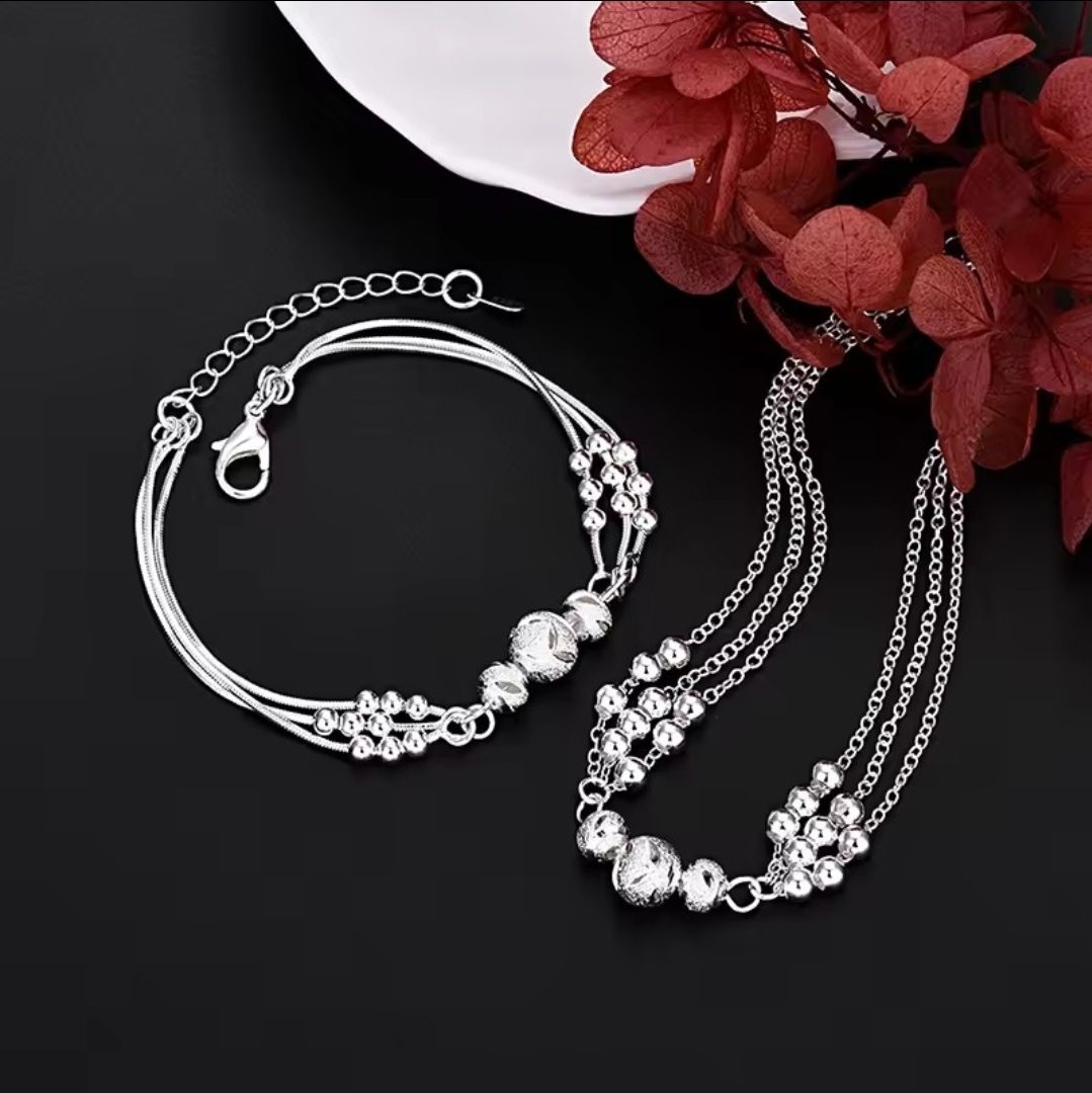 Fijne sieraden set van zilver 925 met armband en een hanger - met bollige elementen 2st